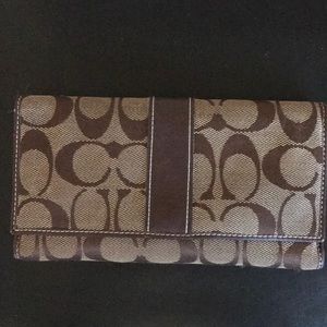 Coach checkbook wallet.